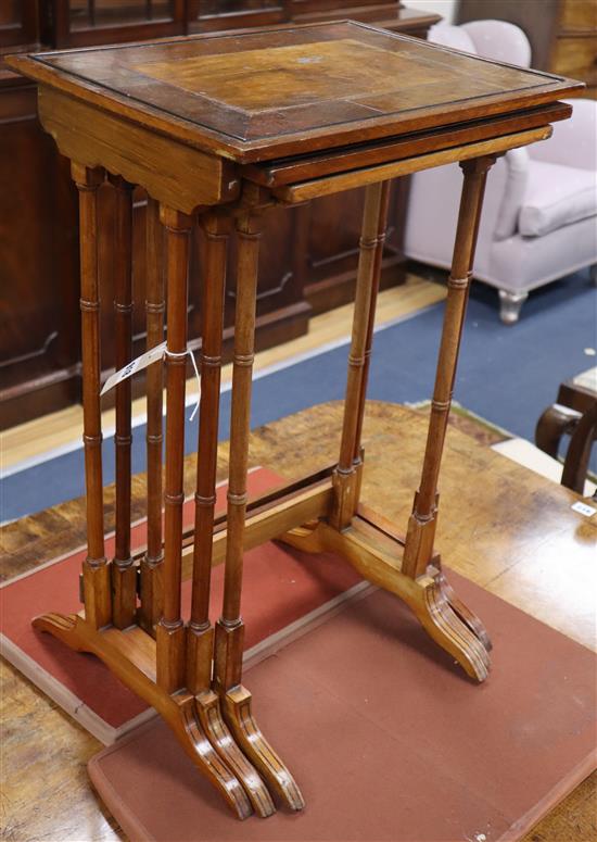 A nest of three George III style figured walnut tea tables W.44cm